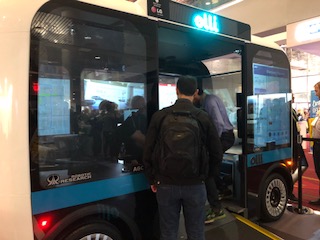 Accessible Olli bus with man getting on