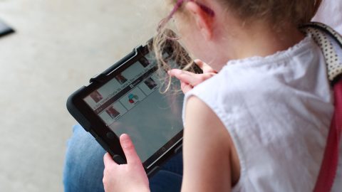 child using ipad