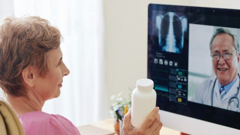 woman talking to doctor during telehealth visit