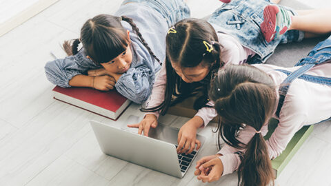 Kids using laptop