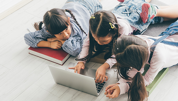 Kids using laptop