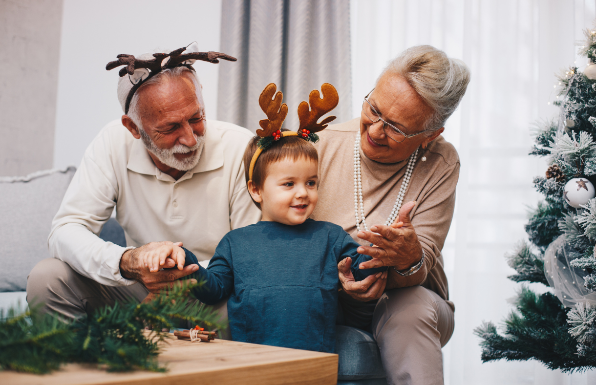 older adult couple with grandchild