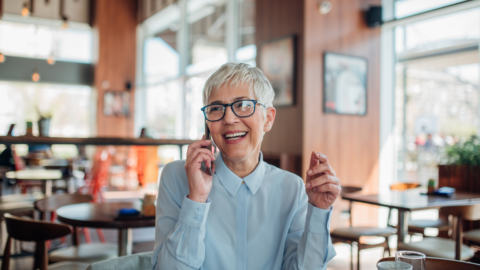 older adult female talking on phone