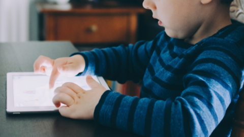 child using ipad