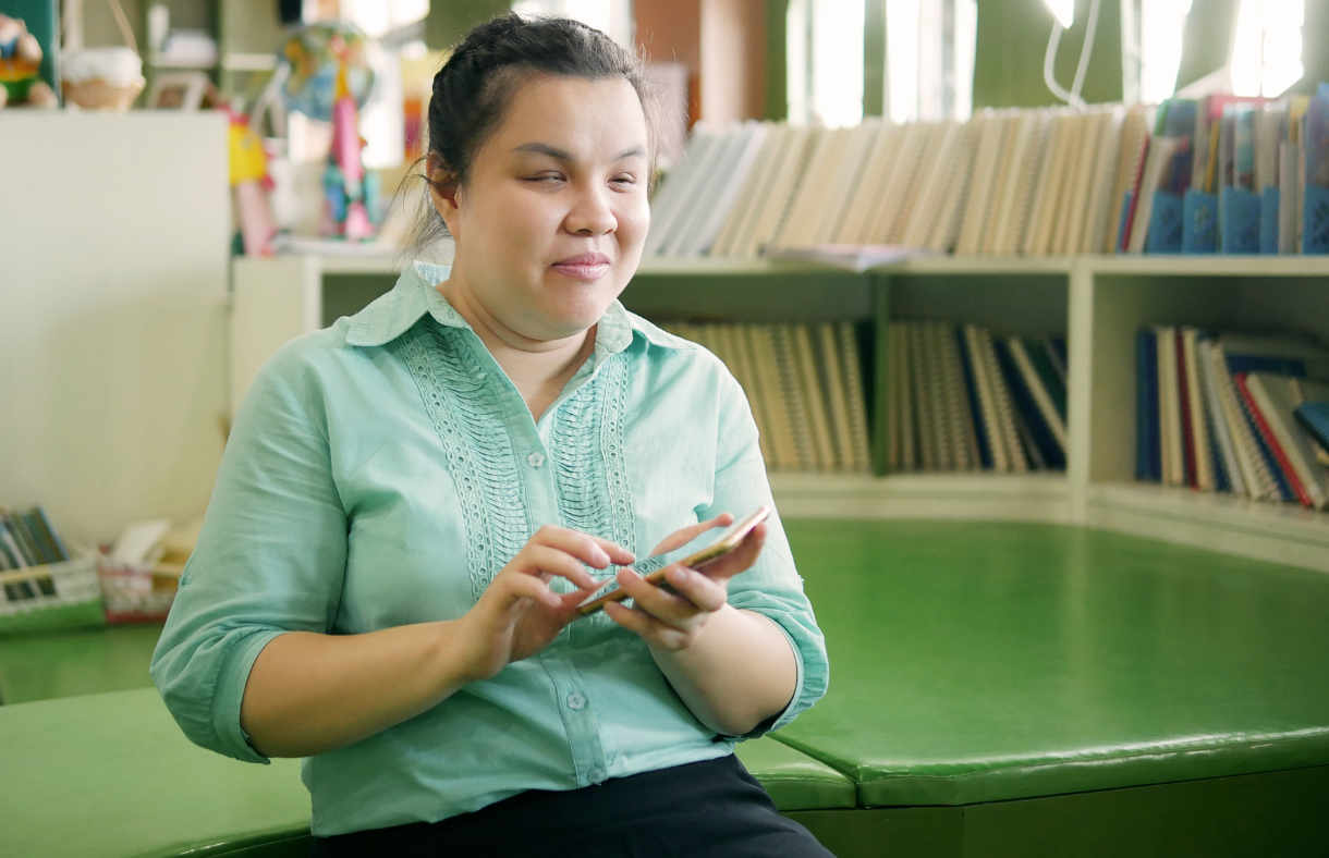 young adult female using phone