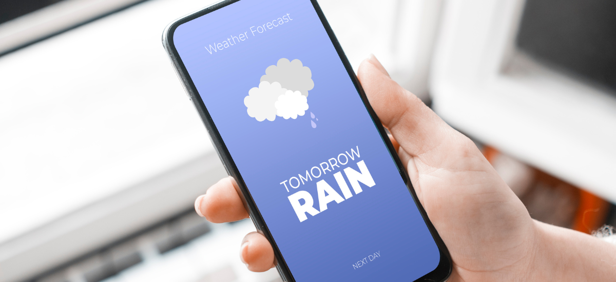 weather app on phone displaying rain tomorrow text