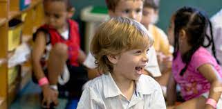 Group of kids engaged in active indoor play