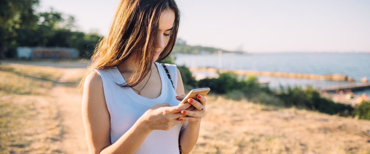 girl in rural area on phone