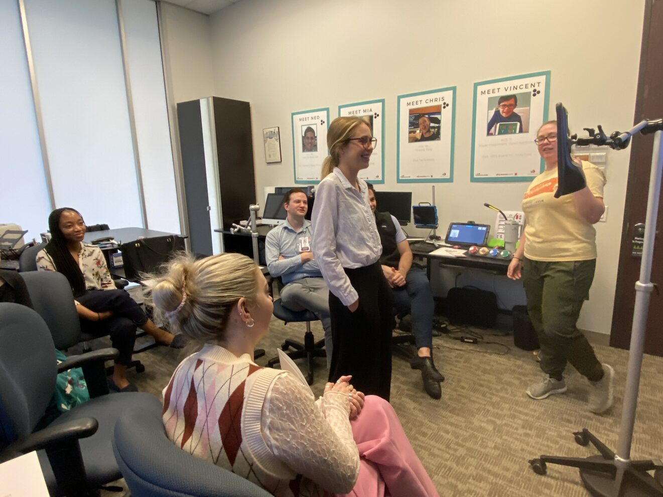 group of people in assistive technology lab learning how to use eye gaze