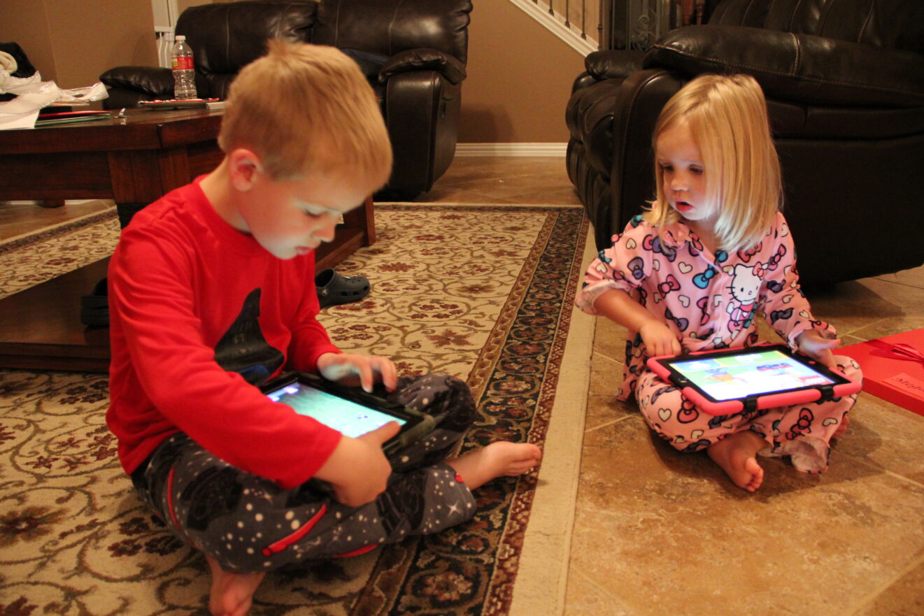 Nostalgia: two Fuchs children with their first iPads, circa Christmas 2012.