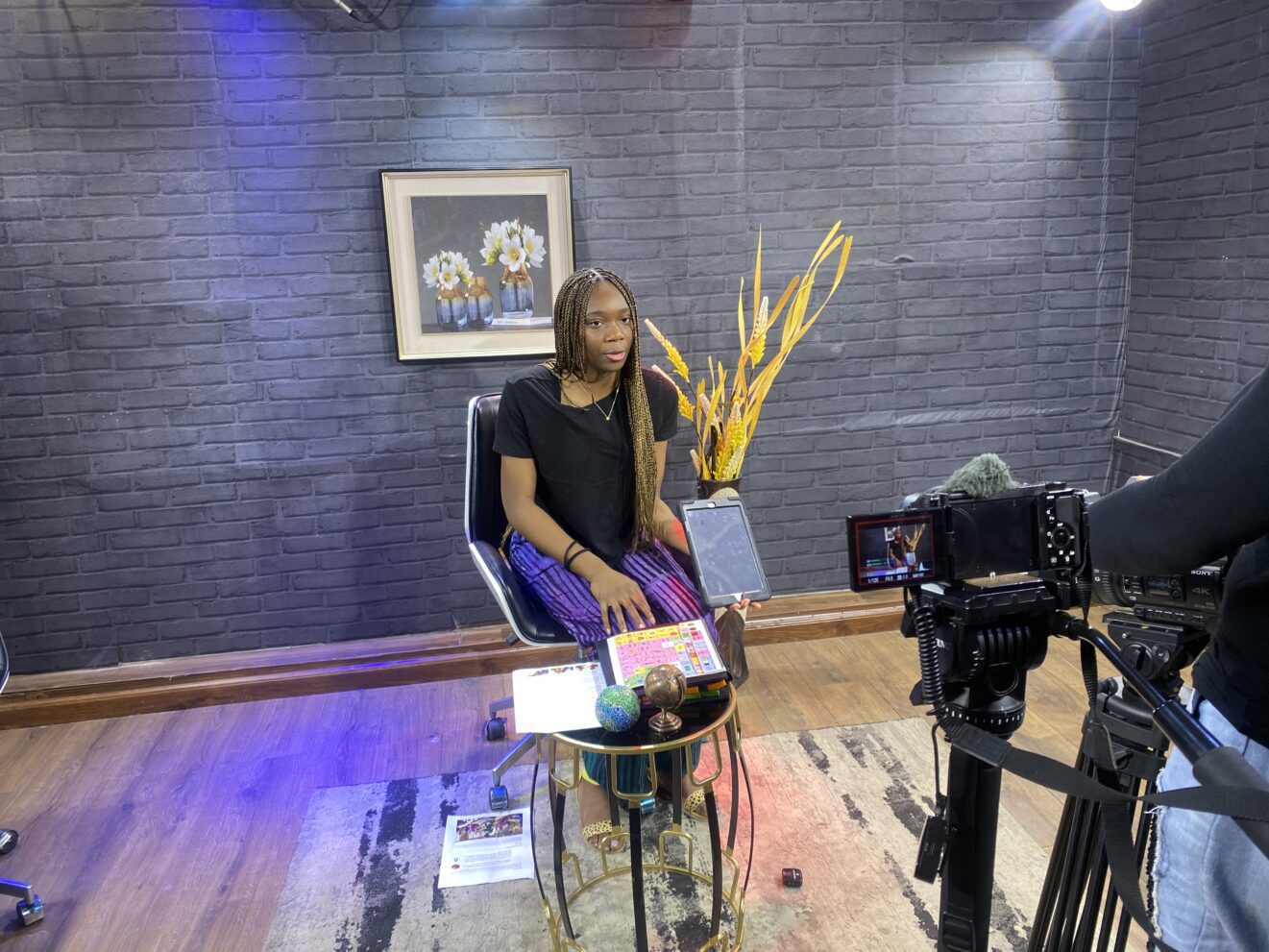 teen girl on a set being interviewed