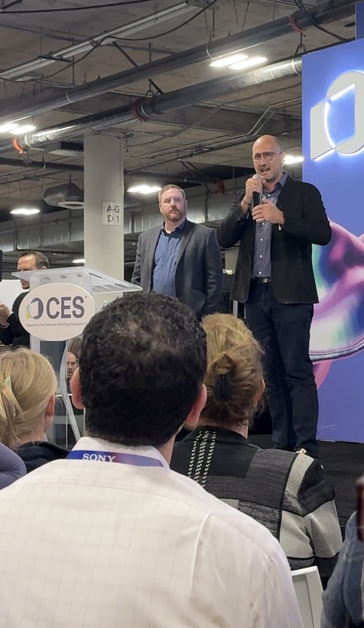 man speaking at conference

