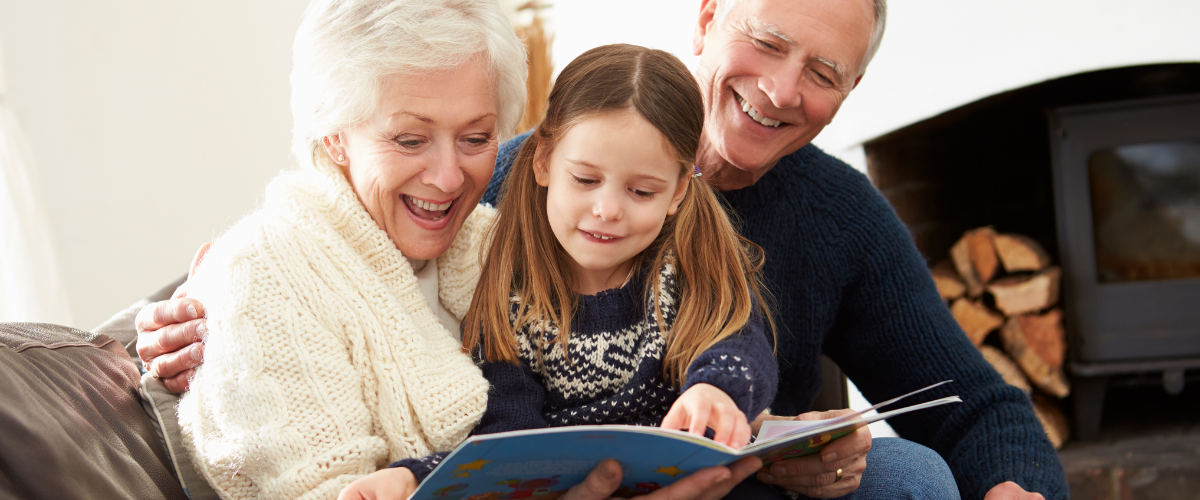 grandparents reading to 2 children