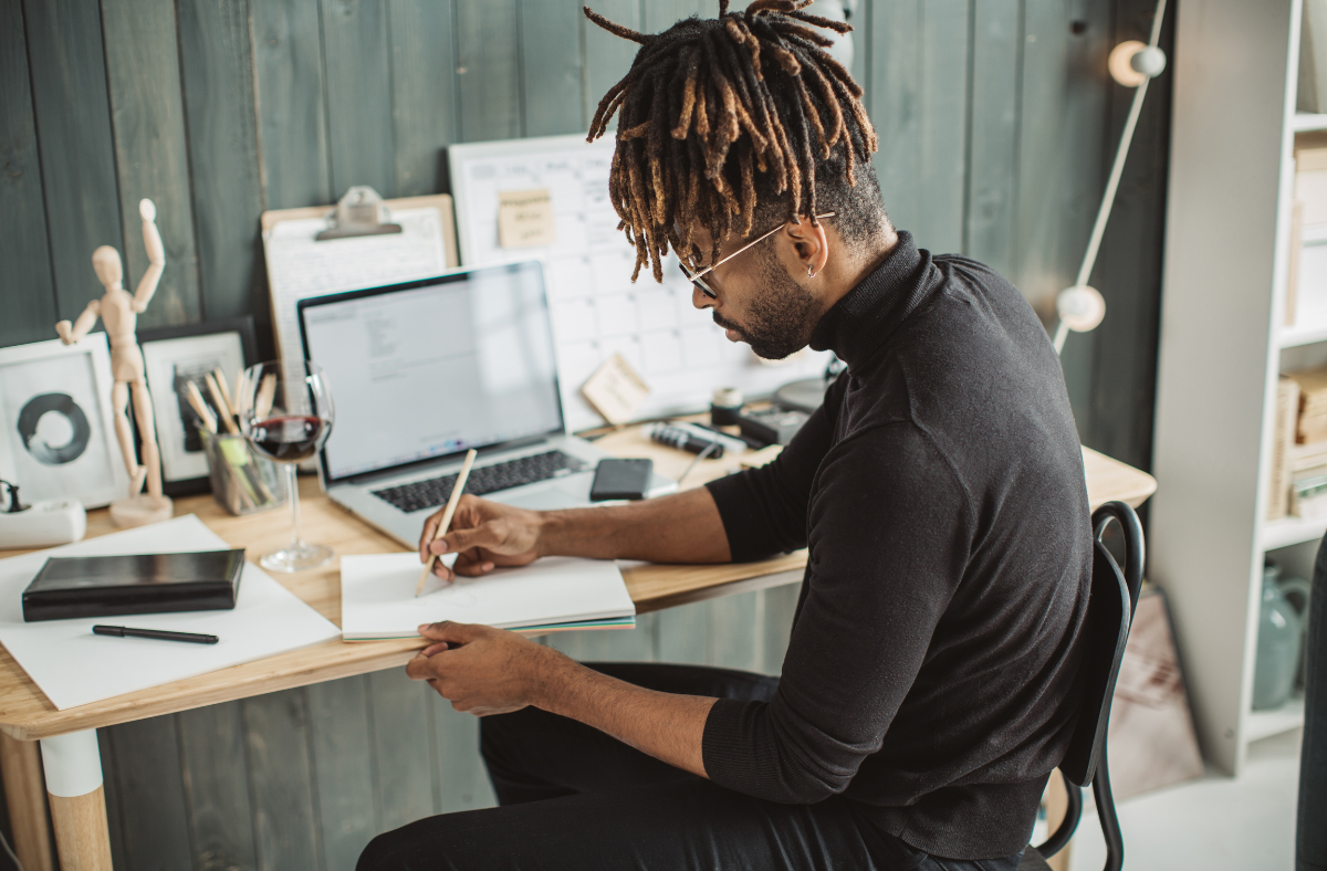 guy sitting at desk working