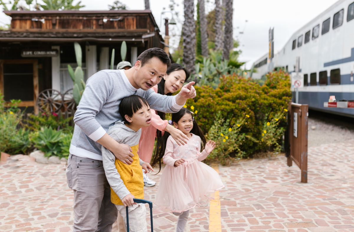 family with 2 young children traveling