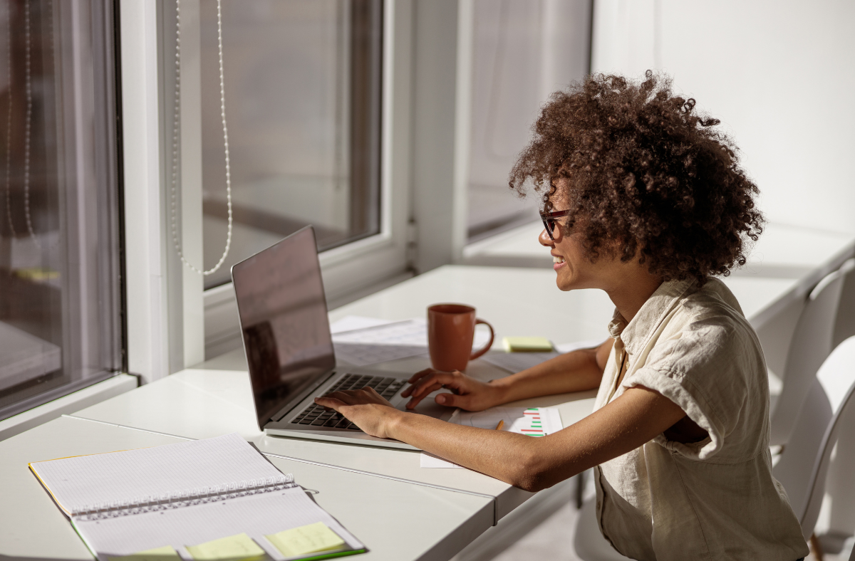 woman looking at laptop